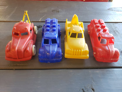 1950's set of four plastic toy autos