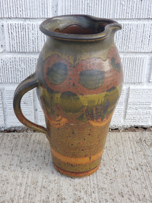 Green print glazed pottery pitcher