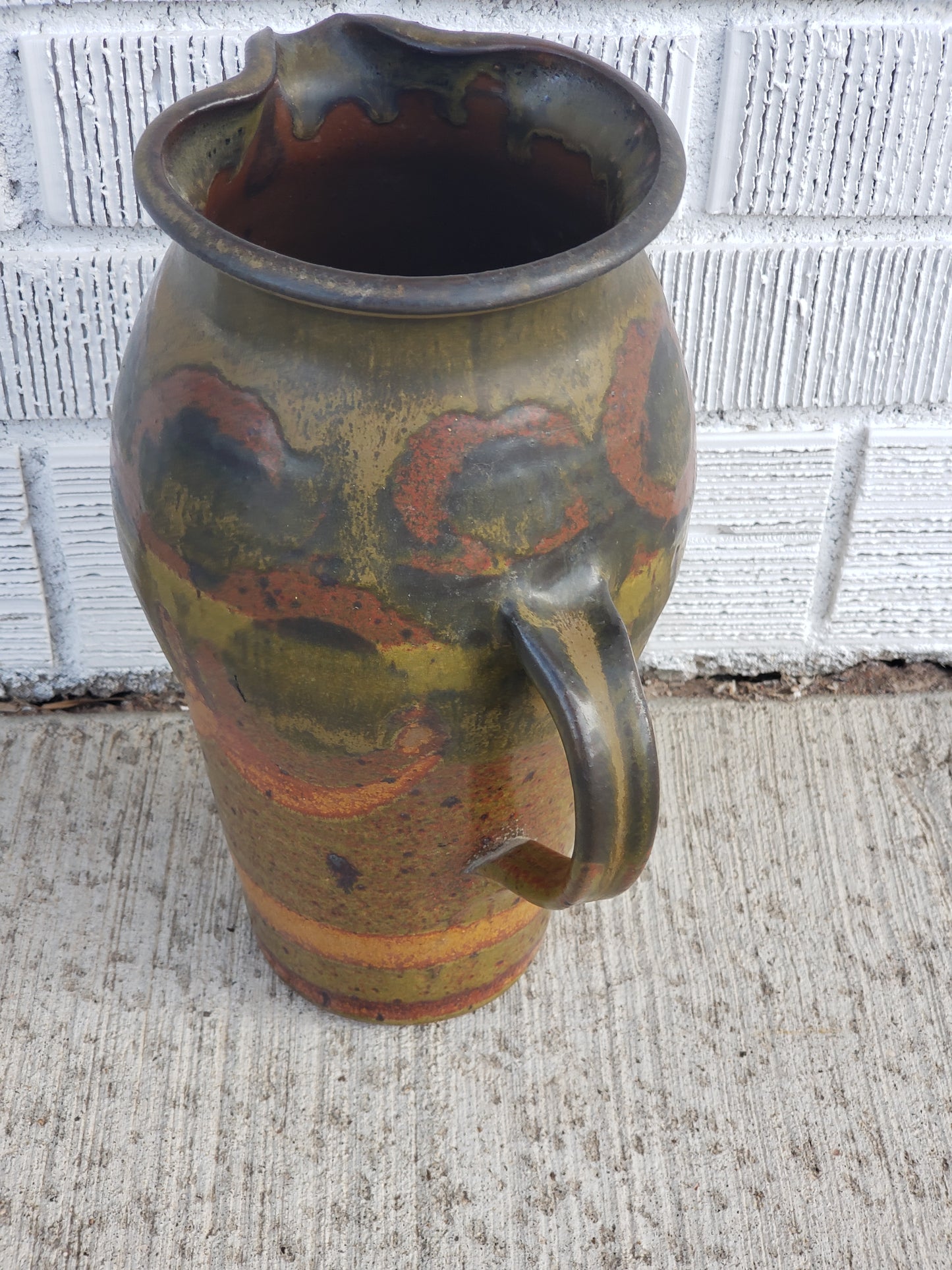 Green print glazed pottery pitcher