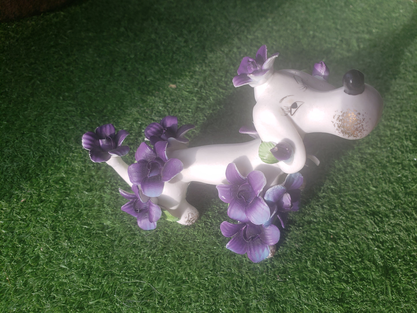 Norcrest (Japan) poodle with purple flowers