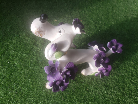 Norcrest (Japan) poodle with purple flowers