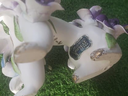 Norcrest (Japan) poodle with purple flowers