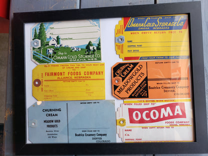 Frame with 6 vintage cream tags