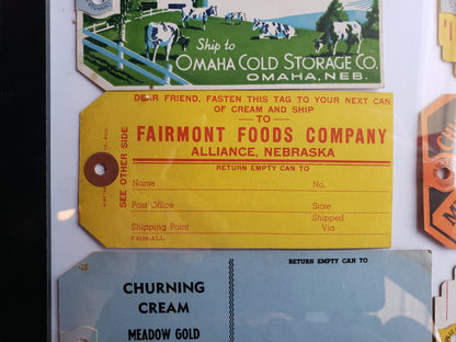 Frame with 6 vintage cream tags