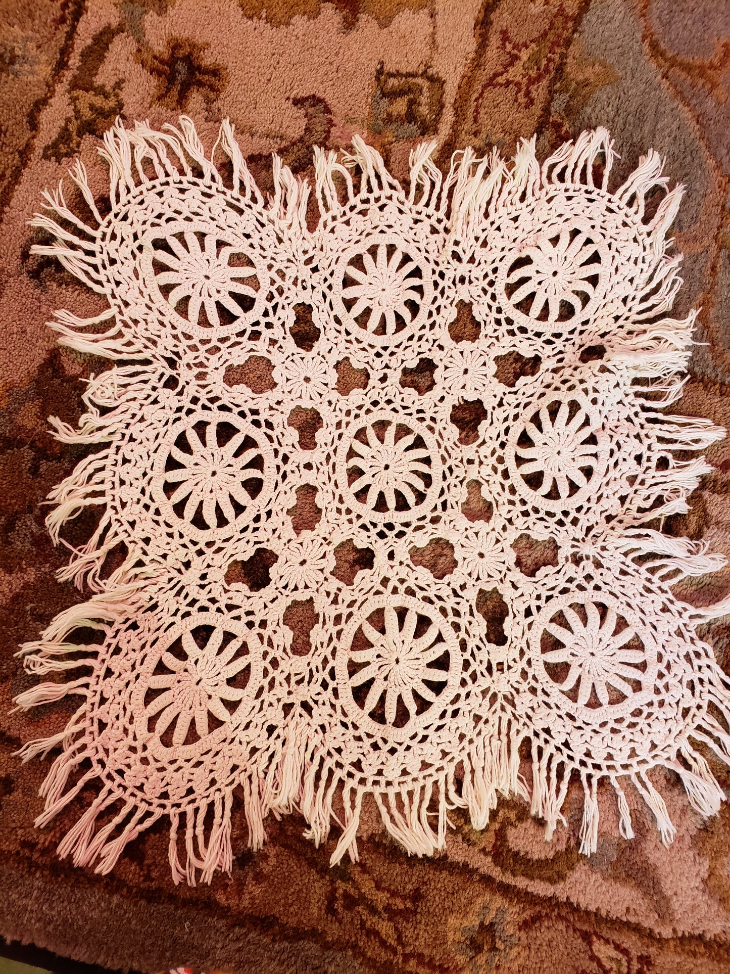 Square crochet doily with fringe