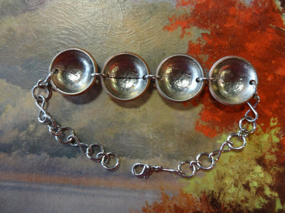 Bracelet with four Wyoming quarters