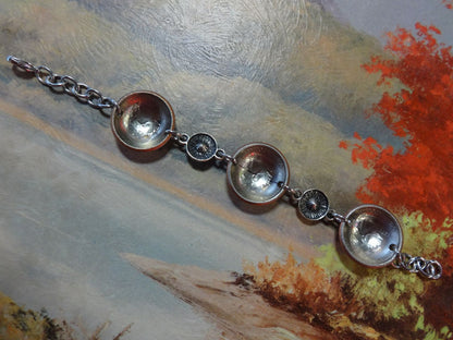 Bracelet with 3 Wyoming Quarters and two light blue and silvertone beads