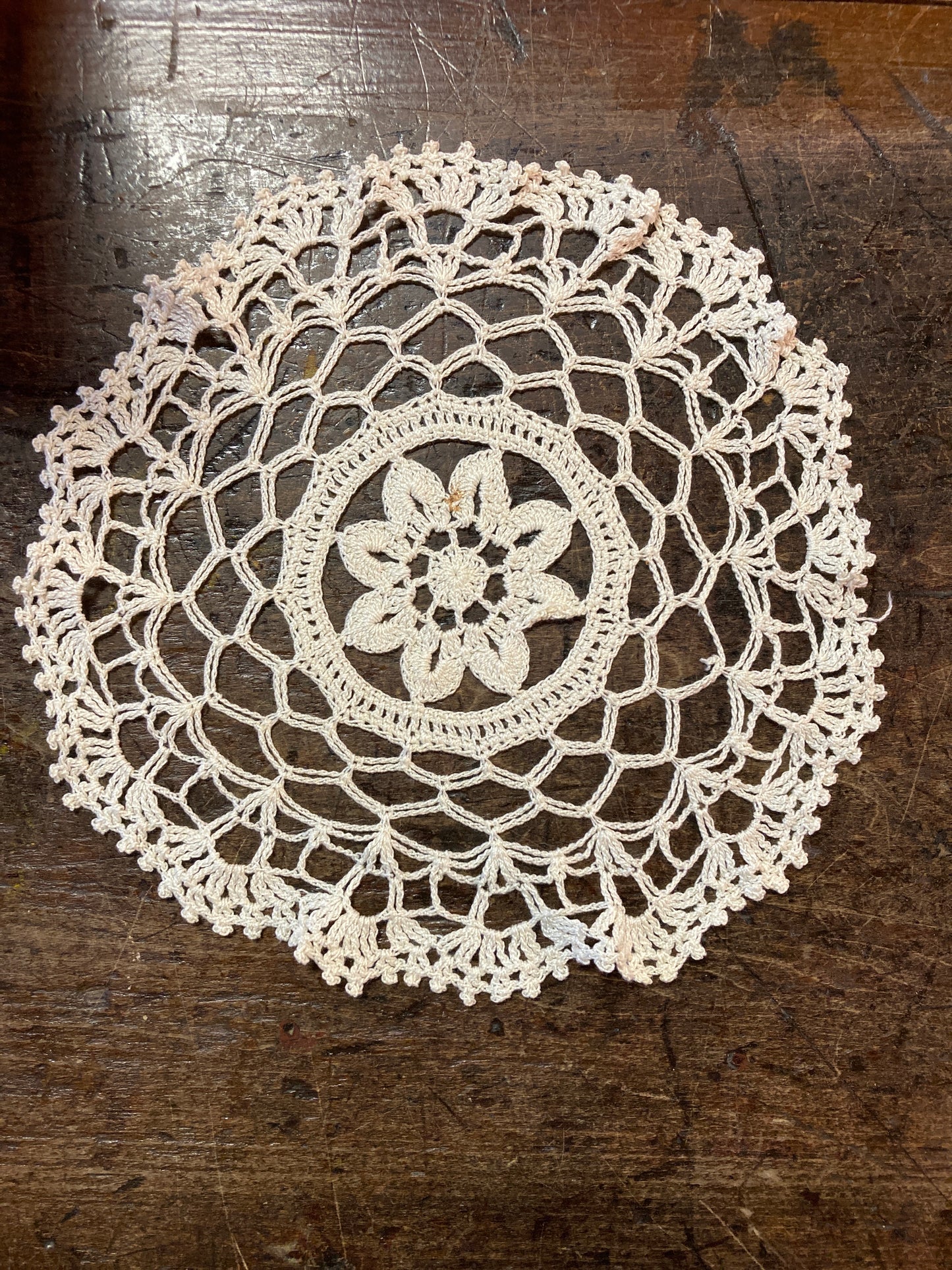 Vintage doily with flower motif