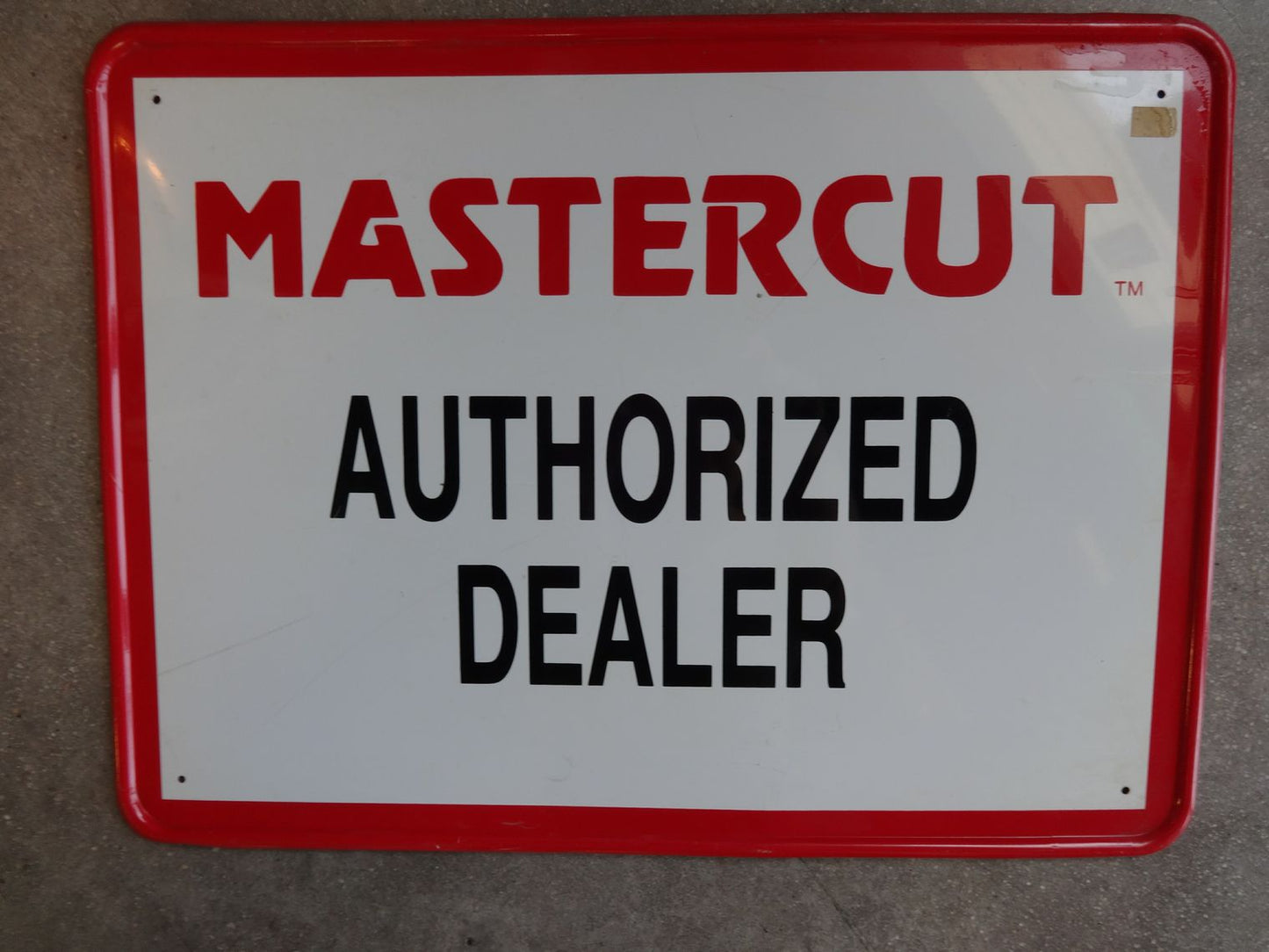 Mastercut Authorized Dealer sign